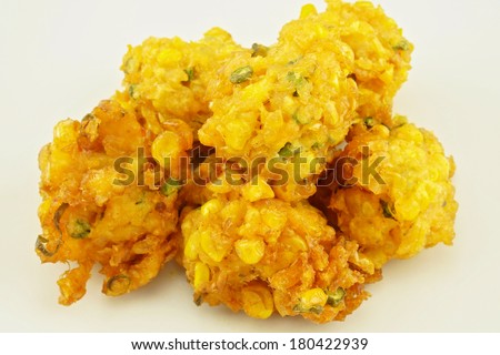 Close up fried corn nugget vegetarian food place on dish background.