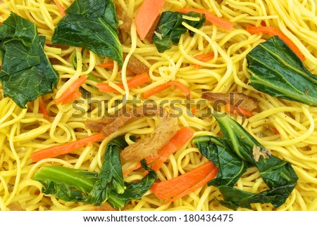 Long life noodle fried with kale, carrots and vegan protein dry.
