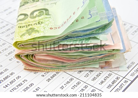 Pile bill of Thailand place on the statement finance account.