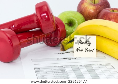 fit and healthy with workout plan, dumbbells and apples