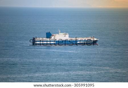 Cargo ship sailing in open sea
