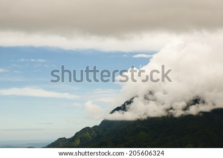 Mount Kinabalu Veiled by Clouds - Borneo