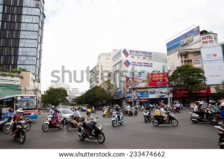 SAIGON, VIETNAM - January 10, 2012 : Street traffic in Ho Chi Minh City (Saigon) which is the biggest city in Southern Vietnam