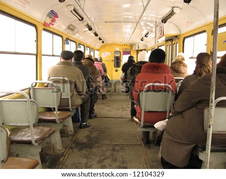 Peoples traveling on the old tram in fog