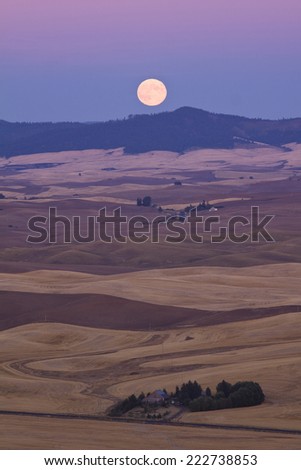 Full moon rising at dusk from Steptoe Butte, Palouse Valley, eastern Washington State