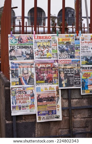 CUSCO, PERU - CIRCA SEPTEMBER 2012 - News headlines from Peru at a newstand in Cusco