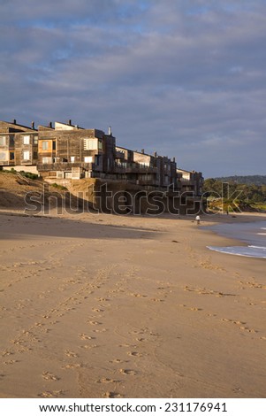 Rising Sea level. Beachfront condo development being undermined by rising ocean levels, Monterey Bay, California, USA