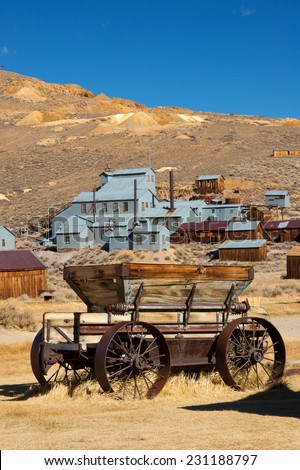 Old hay wagon in front of abandoned gold mine - Bodie State Historic Park, California