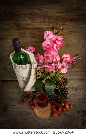 Still life with a flower and  fruit wine