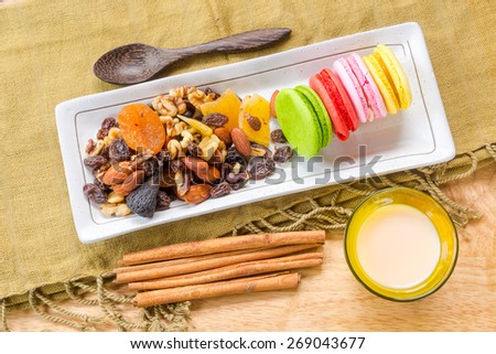 mix dried fruits and colorful macaroons