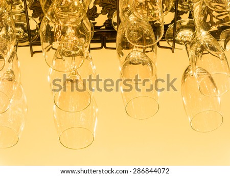 still life with glassware hang on top shelf