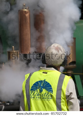 SAINT CLAIR, MICHIGAN - SEPTEMBER 24: An unidentified man blows vehical whistles at the \
