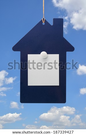 Memo pad on the house-shaped board