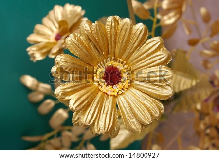 The Golden flower.The Decorative flowers-es of the gilded color.