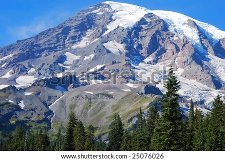 Clear view across a meadow of snow covered Mount Rainer, near Seattle, Washington, USA.
