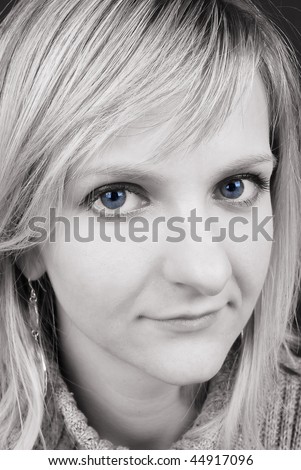 Some nice beautiful young Caucasian  lady with blue eyes closeup. Studio Shoot.
