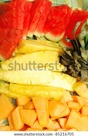 Closeup of Fruit Plate with watermelon, melon, pineapple  on Hawaii party.