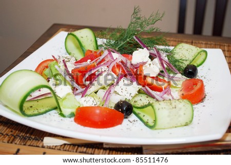 Japanese Cuisine Greece salad  with cheese and fresh vegetables.