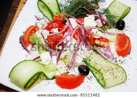Japanese Cuisine Greece salad  with cheese and fresh vegetables.