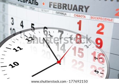 large wall calendar and clock close-up