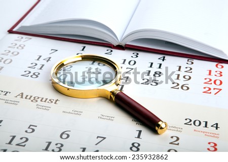 magnifier on the diary close up