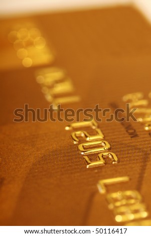 detailed close up of a gold credit card