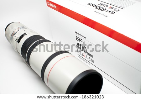 New York City, USA - April 8th, 2014: Canon EF 400mm f/5.6L USM Lens with Canon lens box.  It is the most lightweight 400mm L lens from Canon.