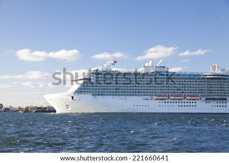 New York City, U.S.A - October 4, 2014: A large cruise ship is sailing at Hudson River.  View from Louis Valentino Junior Park at Brooklyn, New York City.