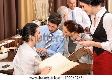 Business lunch executive people looking menu  waitress take order restaurant