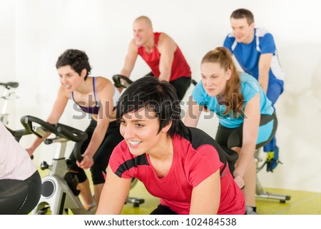 Fitness group of people on bicycle