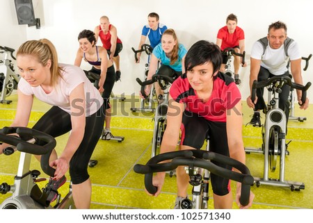 people at the gym enjoy physical workout