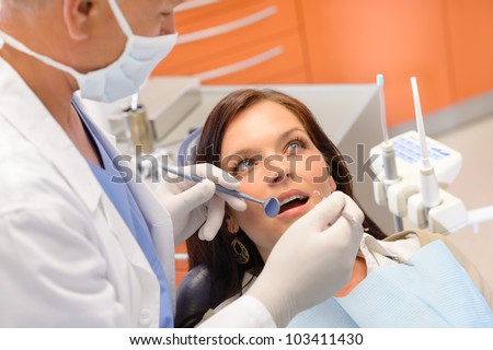 Healthy patient at dentist office have teeth checkup stomatology