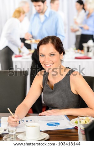 Business woman at company meeting work during buffet lunch