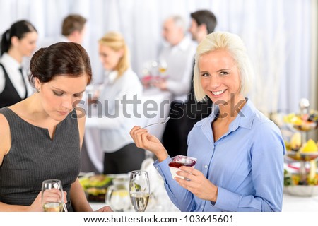 Business meeting buffet smiling woman eat dessert formal company event