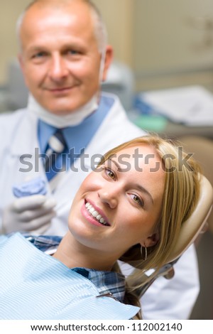 Healthy patient at dentist office have teeth checkup stomatology