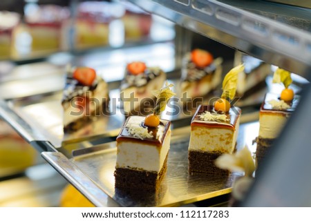 Cake and pastry in window display canteen food dessert tasty