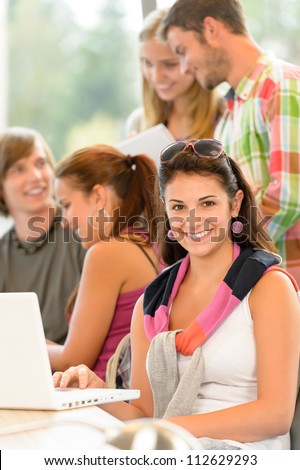 High-school study group learning in library class students teen smiling
