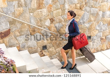 Smiling woman business going traveling baggage shoulder bag leaving