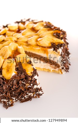 Banana dessert cake with dark chocolate topping sweet treat