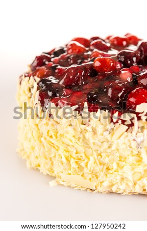 Delicious almond cake with red berries topping sweet dessert