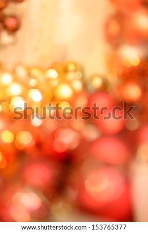 Christmas bulbs glittering blurred background red and gold
