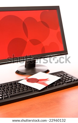 Love-letter on computer keyboard on white background