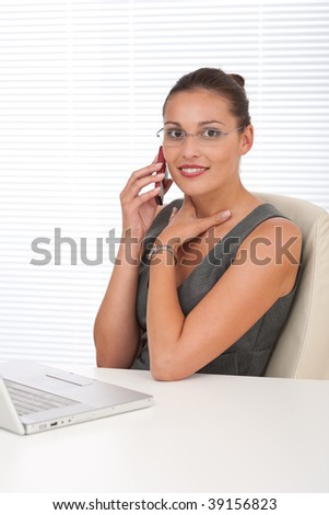 Corporate manager working with laptop at the office