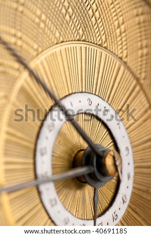Detail of antique clock with Arabic numeral, macro lens