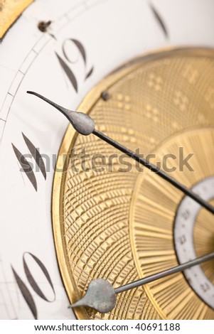 Detail of antique clock with Arabic numeral, macro lens