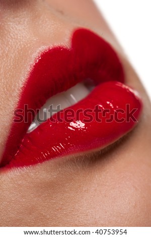 Close-up of gloosy red woman lips, macro lens