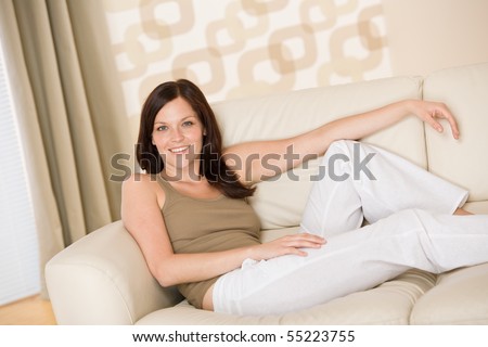 As one of your favourite online adult sex toys sex shop we have 1000's of ... stock photo smiling woman relax sitting on sofa in lounge 55223755 As one of your favourite online adult sex toys sex shop we have 1000's of ...