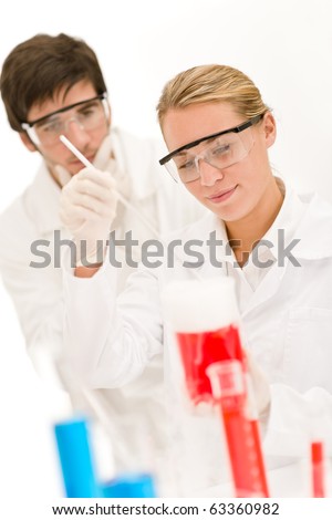 Chemistry experiment -  scientists in laboratory testing flu virus vaccination