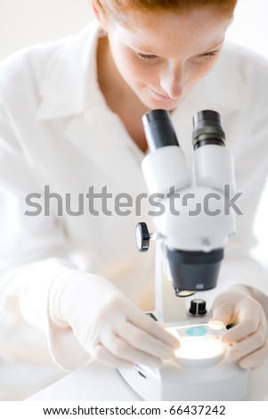 Microscope laboratory - woman medical research chemist experiment, shallow depth-of-field