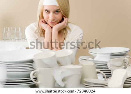 Modern kitchen - tired woman in kitchen, fed up